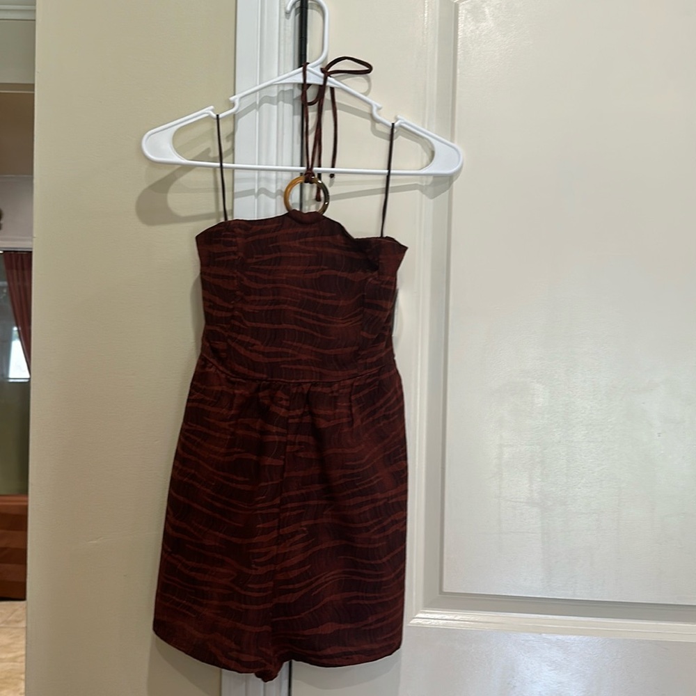 Old Navy super nice romper new with tags.  Very nice color and confortable.